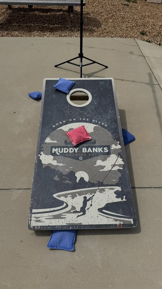 Bourbon Club of Arkansas competing against Florida Bourbon Club in cornhole at Barrel King Bourbon Games